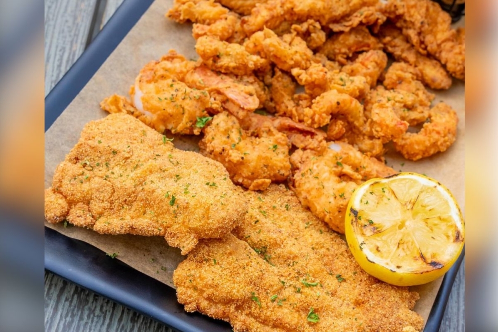 The fried sampler platter ($32) at Gazebo Seafood House includes catfish, chicken tenders, shrimp, crawfish tails and hand cut french fries. (Courtesy Gazebo Seafood House)