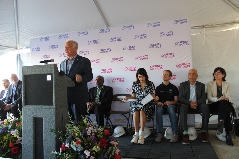 Austin Mayor Kirk Watson reminisces on when the airport was first opened in 1990. (Haley McLeod/Community Impact)