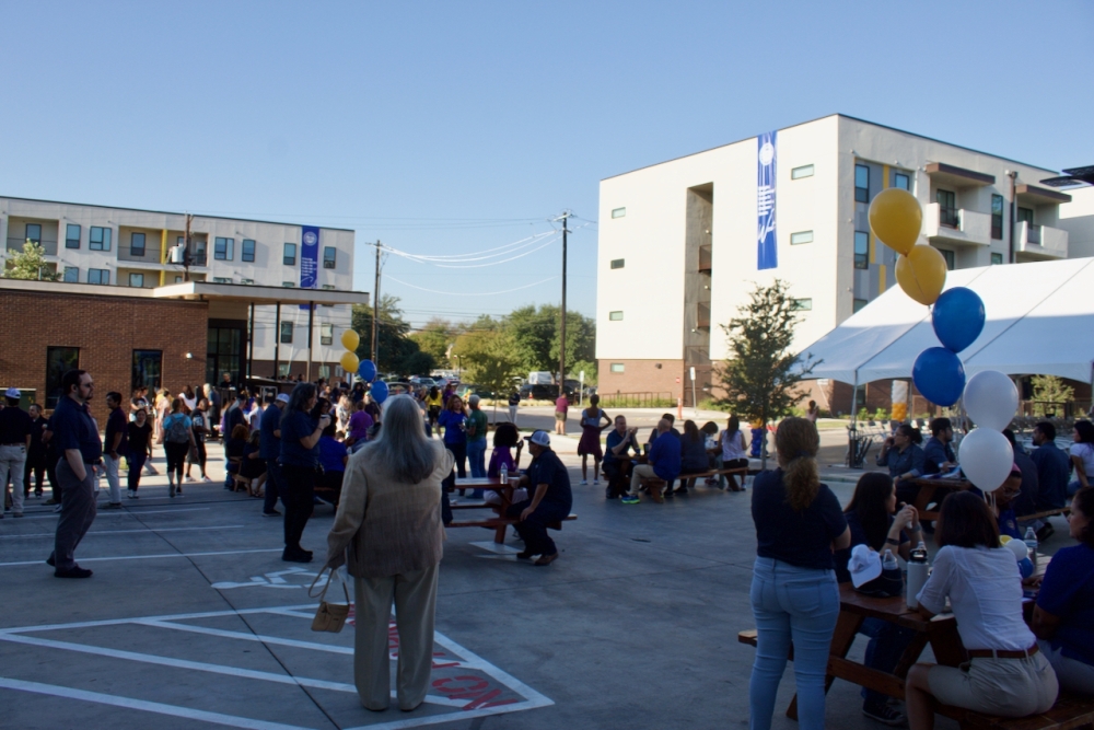 Area officials, HACA representatives and residents celebrated the completion of Pathways at Chalmers Courts in October. (Ben Thompson/Community Impact)