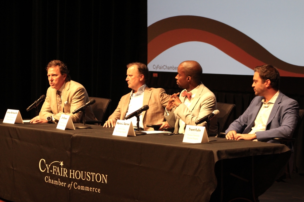 From left: Jerry Ashworth, CEO of Memorial Hermann Cypress Hospital; Jim Brown, CEO of HCA Houston Healthcare North Cypress; Mario Garner, CEO of CHI St. Luke's The Vintage Hospital; and Trent Fulin, CEO of Houston Methodist Cypress Hospital, participate in a Sept. 10 economic forum hosted by the Cy-Fair Houston Chamber of Commerce. (Danica Lloyd/Community Impact)