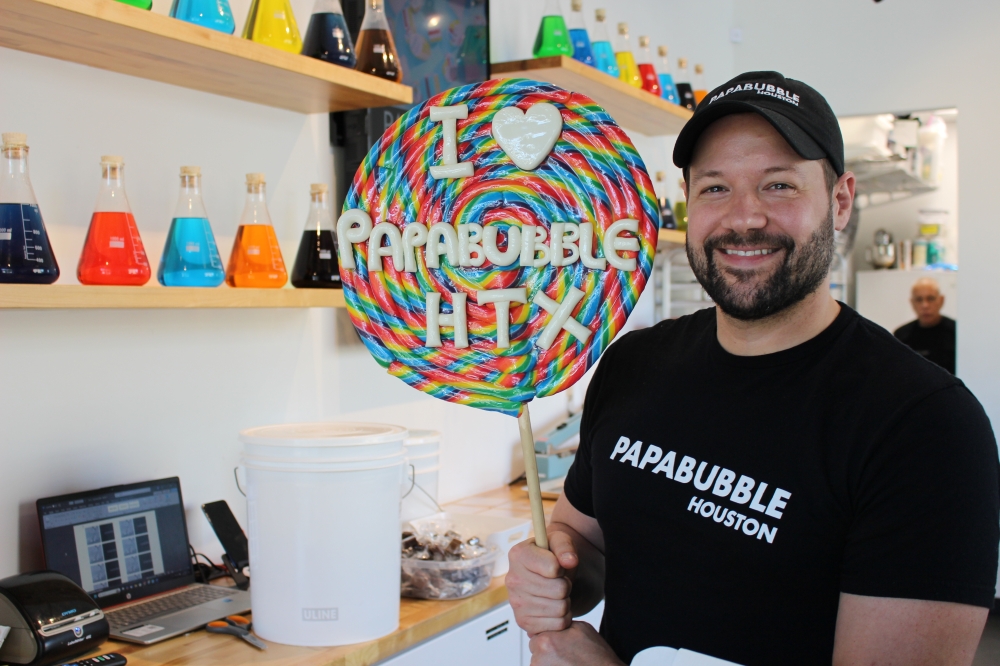 Franchise owner Jesse Cushman enjoys teaching people the candy-making process, he said. (Asia Armour/Community Impact)