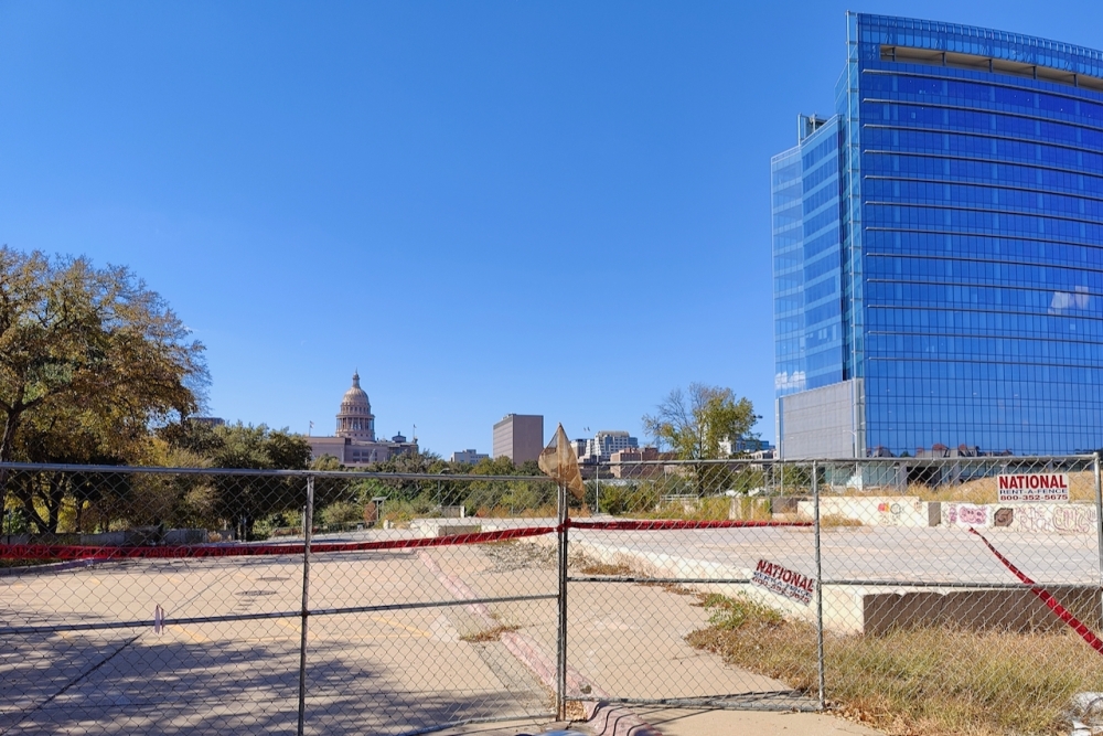 The city-owned property is located in the Innovation District near Waterloo Park and several medical facilities. Future development could be affected by Austin's Capitol View Corridors, or regulations that prevent new construction from blocking sightlines to the state capitol. (Ben Thompson/Community Impact)