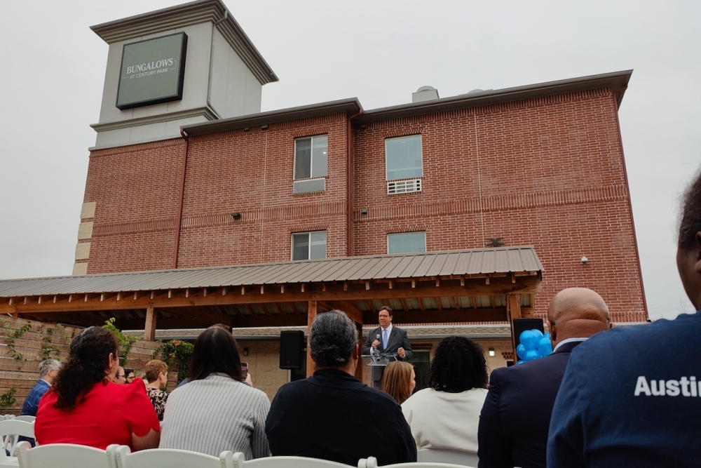 Integral Care CEO Jeff Richardson spoke at the opening ceremony for Bungalows at Century Park. (Ben Thompson/Community Impact)