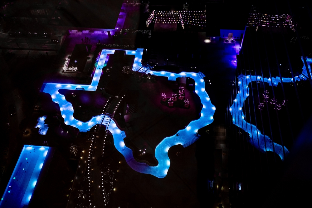 Marriott Marquis Houston is transforming its Texas shaped pool into a holiday light floating experience. (CourtesyMarriott Marquis Houston)