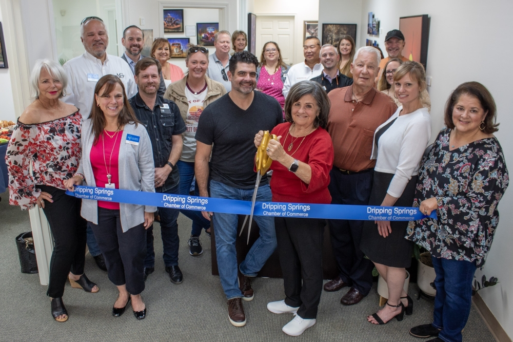 Texas Hills Financial Group owner Melody Kump (right center) celebrated the relocation with friends, family and business partners. (Elisabeth Jimenez/Community Impact)