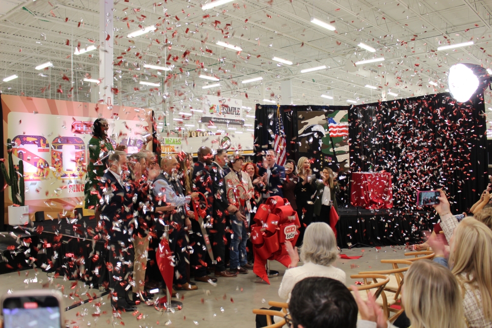 The South Congress H-E-B leadership team celebrated the store's reopening with a ribbon cutting on Dec. 3. (Sarah Hernandez/Community Impact)