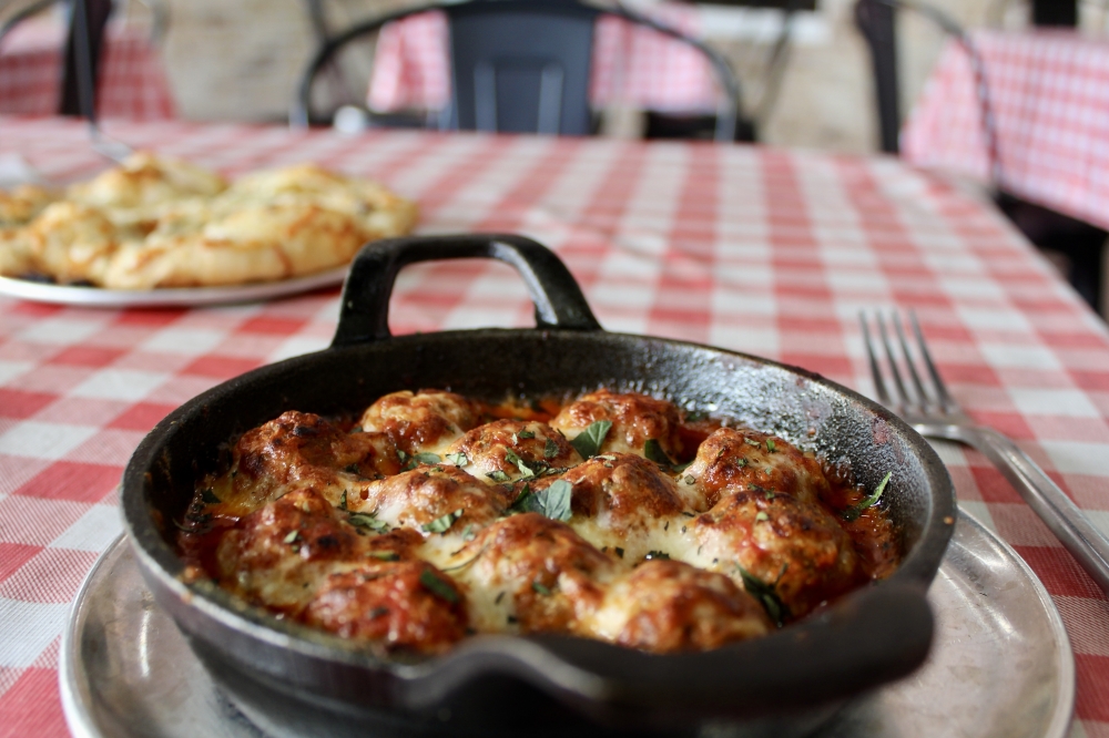 The cast iron baked meatballs ($10) were added to the menu in October along with other cast iron skilled items. (Jovanna Aguilar/Community Impact)