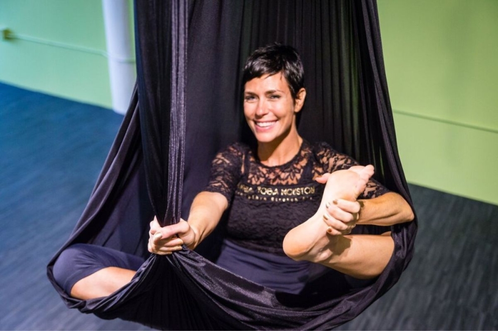 Nicole Haagenson has been in the yoga industry for more than two decades, and teaches the health benefits of yoga—which she said go beyond physical. (Courtesy Aerial Yoga Houston)