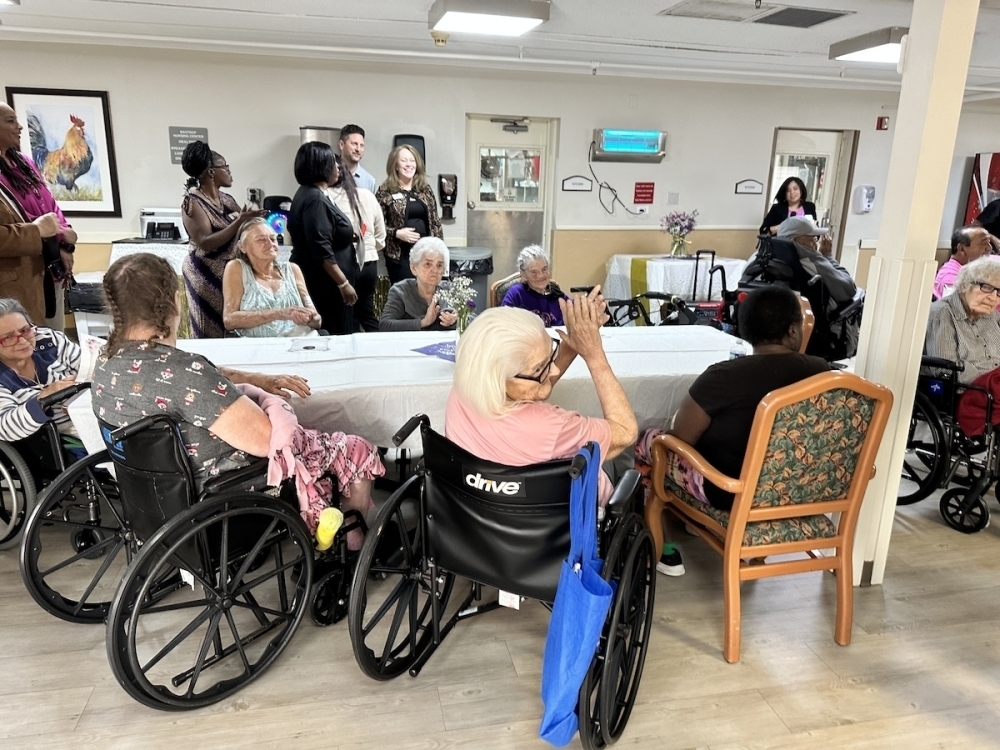 Residents of Windsor Nursing and Rehabilitation Center of Bastrop helped celebrate a resident's 107th birthday in March. (Amanda Cutshall/Community Impact)