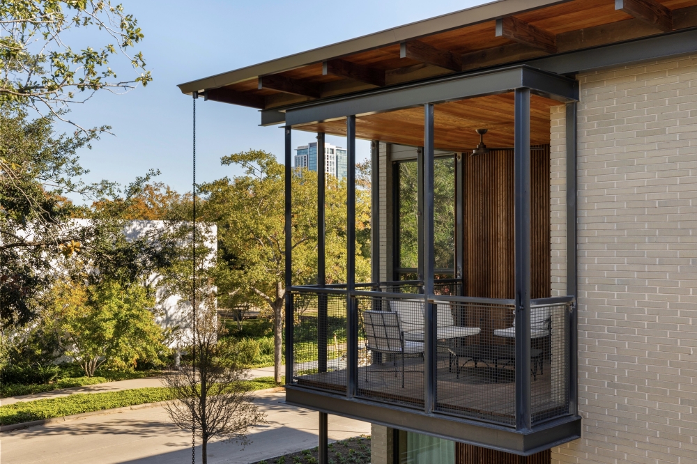 Open-air bridges and porches connect each building to create a residential feeling. (Courtesy Julie Soefer)