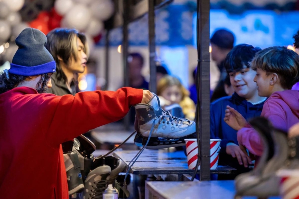 The Woodlands Town Center's 21,000-square-foot Ice Skate Rink features festive lighting, a state-of-the-art sound system, tables for parties and concessions. (Courtesy The Woodlands Town Center)