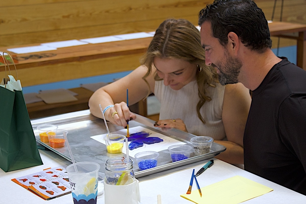 Members of the Dripping Springs community customized their own glass butterflies at the first butterfly workshop that's part of a campaign to raise money for a new facility. The butterflies will hang in the new facility, as if they are flying. (Elle Bent/Community Impact)