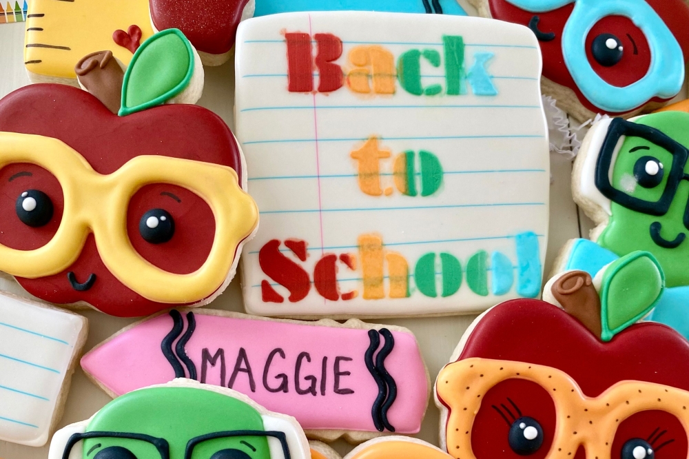 The business decorates cookies by theme including back to school cookies, Mother's Day cookies and more. (Courtesy Penny Royal Bakery)