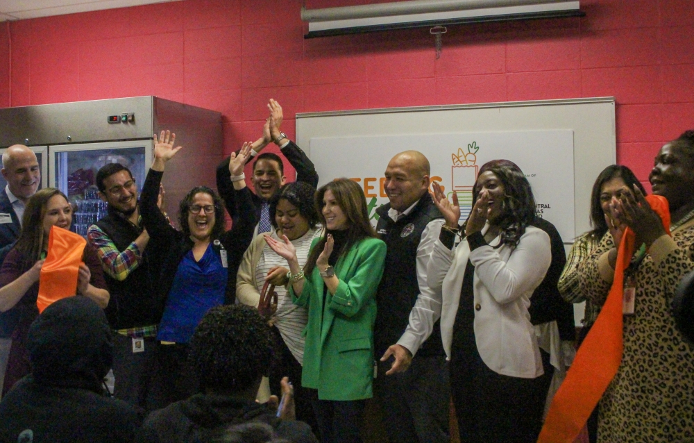 Galindo Elementary Principal Natascha Barreto-Romero, Austin ISD Superintendent Matias Segura, Central Texas Food Bank President Sari Vatske, school and district staff and other community members celebrated the opening of a food pantry at Galindo Elementary School. (Elisabeth Jimenez/Community Impact)