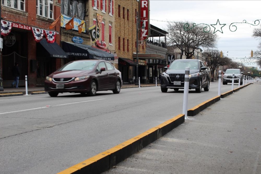 New street barriers have been installed along several blocks of Sixth Street downtown. (Ben Thompson/Community Impact)