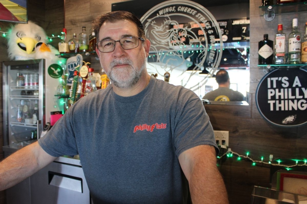 Scott Boyer, owner of Philly Flats in Katy, takes pride in his Reading, Pennsylvania roots. (Asia Armour/Community Impact)