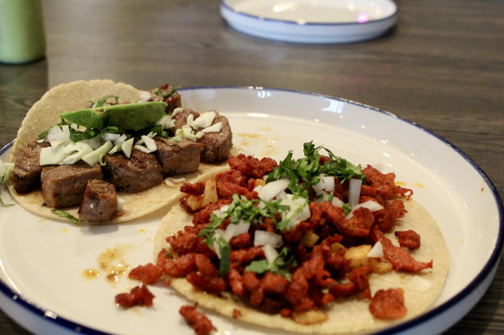 At Luchador Micheladas y Botanas customers can enjoy street tacos made with tortillas made is house. (Jovanna Aguilar/Community Impact)