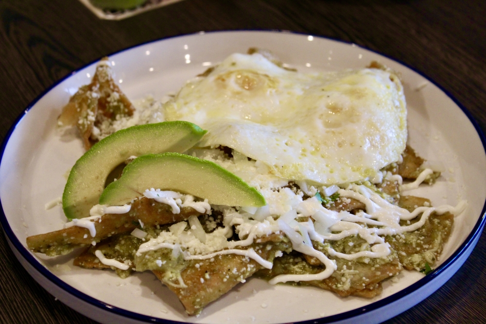 Luchador Micheladas y Botanas is known for its chilaquiles ($14.98). (Jovanna Aguilar/Community Impact)