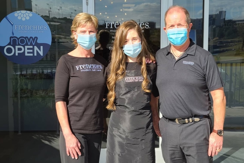 Frenchies Modern Nail Care Lakeway owners Diana Wagner, left, Keith Wagner, right, with daughter Brittany, center, opened the nail salon during the COVID-19 pandemic. (Courtesy Frenchies Modern Nail Care Lakeway)