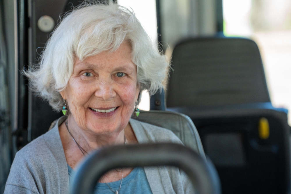 Senior day health care in Austin participant smiles