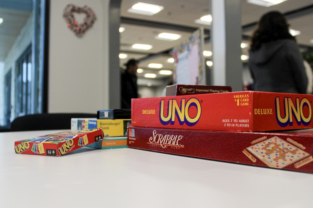 Participants at the AGE of Central Texas Thrive Social and Wellness Center can play board games, practice piano, do art and more. (Elisabeth Jimenez/Community Impact)