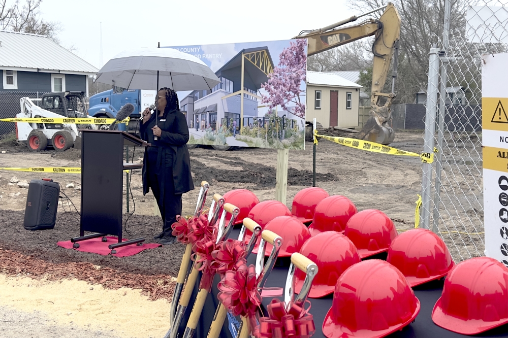 Executive Director Tresha Silva highlighted the significance of the expansion during the rainy Feb. 14 ribbon-cutting ceremony. (Amanda Cutshall/Community Impact)