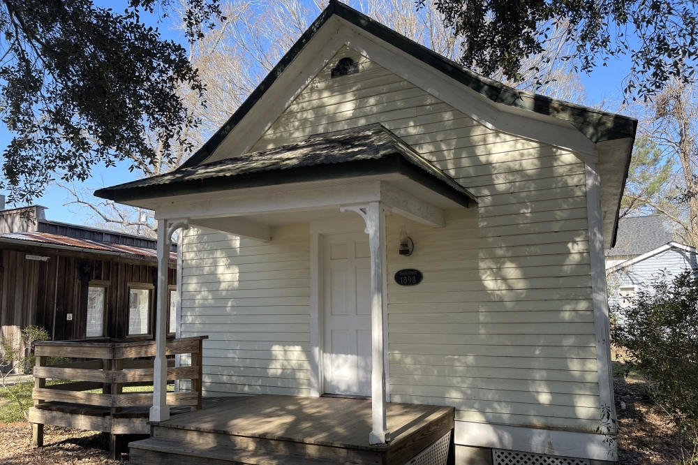 The West Bay Common School No. 13 was built in Chambers County in 1898. After nearly 40 years in operation, it was closed and used as a house and storage facility. It was moved to League City in the early 1990s. (James T. Norman/Community Impact)