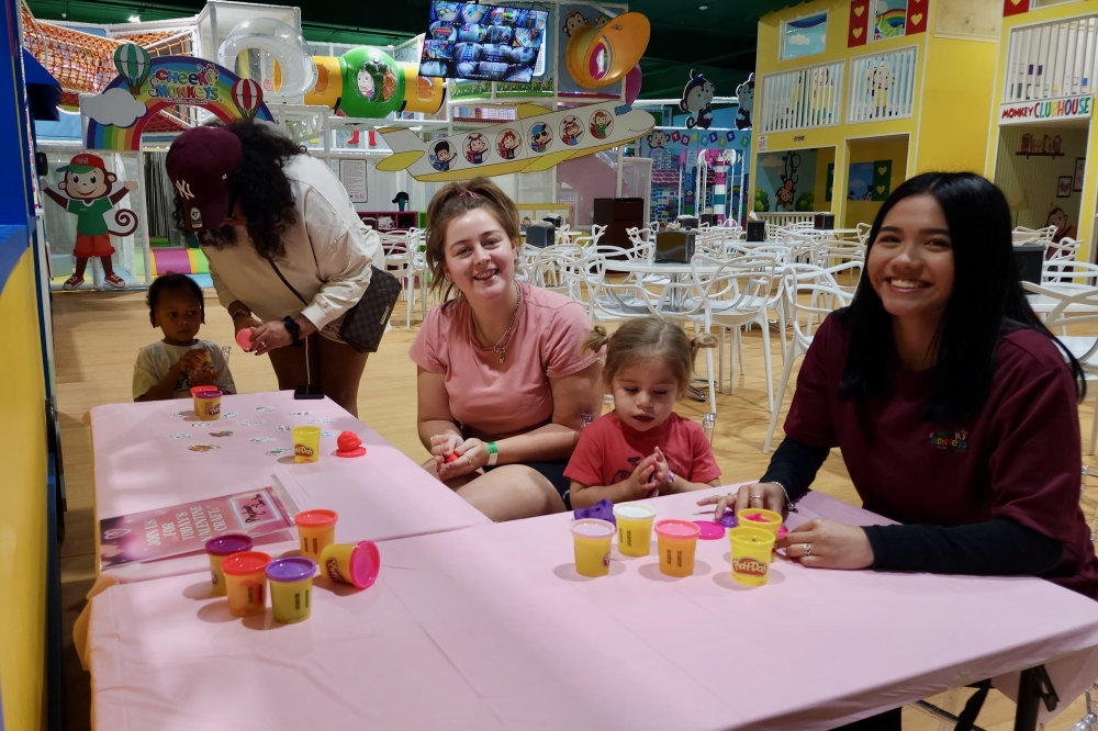 The facility showcases a supervised, visually open play area with educational and play-based stations. (Courtesy Cheeky Monkeys)