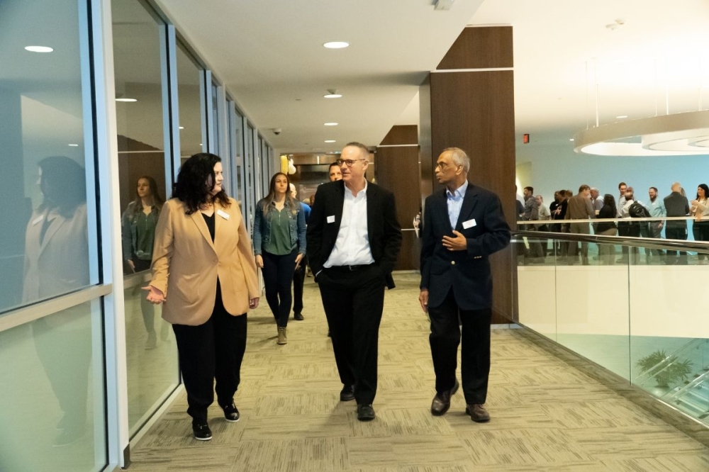 Invista CEO Brook Vickery (center) toured the new Texas Technology Center during its unveiling in mid-February. (Courtesy Invista)