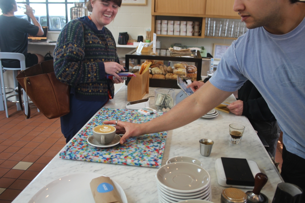 Café supervisor Westley Williamson said First Light has loyal regular customers, who’ve built friendships with the baristas and booksellers. (Gracie Warhurst/Community Impact)