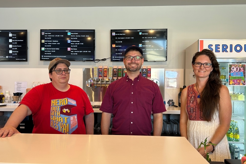 From left: Ross Winner, Clint Bradley and Amy Bradley opened 3rd Level Brewing in June 2023. (Brooke Sjoberg/Community Impact)