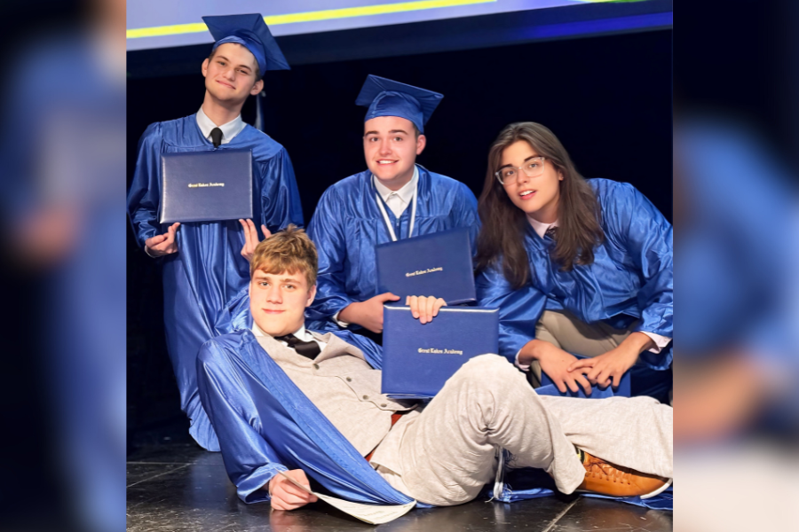 Students posing with their diplomas at Great Lakes Academy