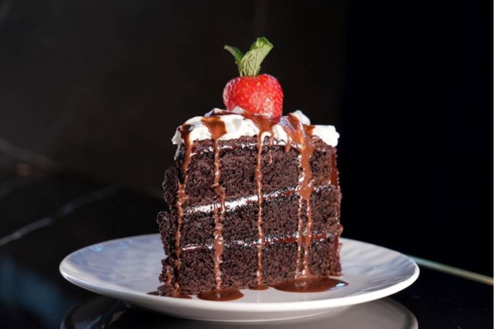 Dessert options will include a triple layer chocolate cake and deep-fried bread pudding, per the release. (Courtesy Confessions Restaurant & Lounge)