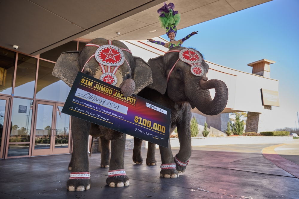 Elephants hold up jumbo jackpot sign