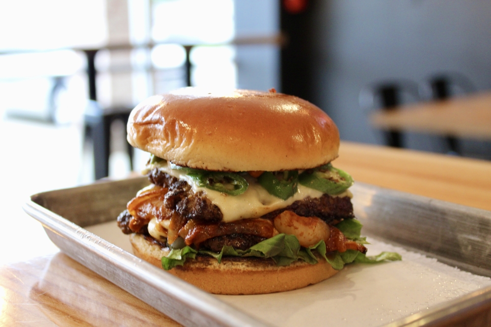 Burgers at Urban Skillet contain half-pound of meat. (Jovanna Aguilar/ Community Impact)