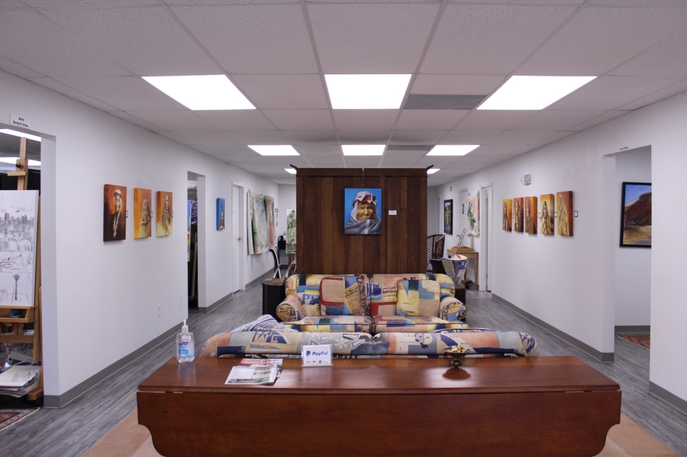 Fine art hanging in an art gallery and studio available to purchase in The Woodlands near Houston