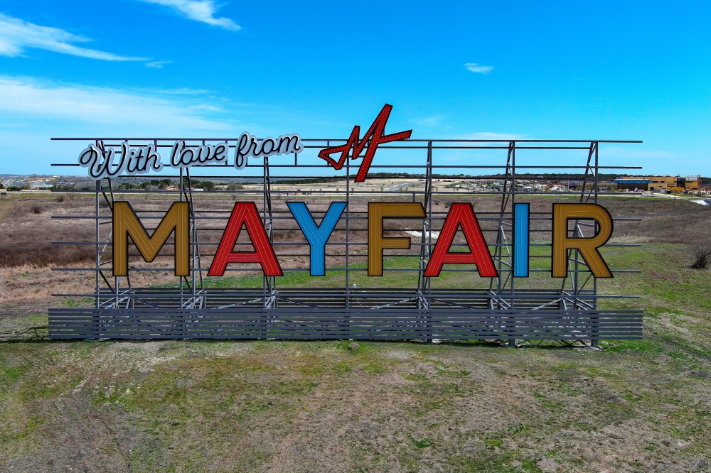 Sign in front of Mayfair a master-planned community in New Braunfels with homes in the $300s and $400s