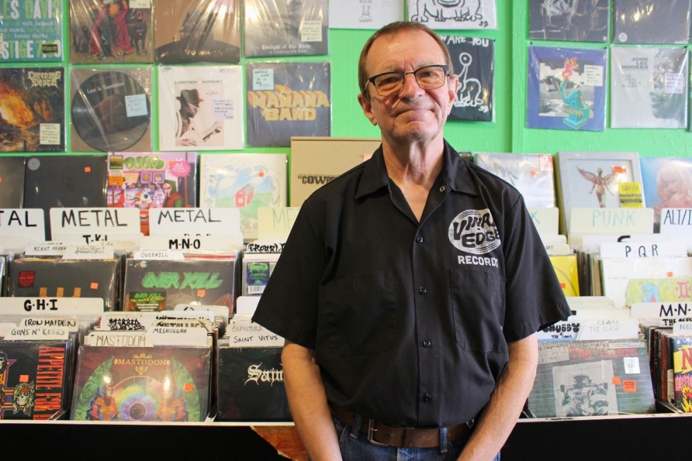 Chuck Roast is a former punk rock DJ and the owner of Vinal Edge. (Asia Armour/Community Impact)