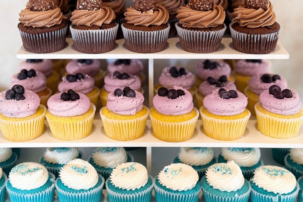 Cupprimo's chocolate truffle, lemon blueberry and blue velvet cupcakes. (Courtesy Cupprimo)