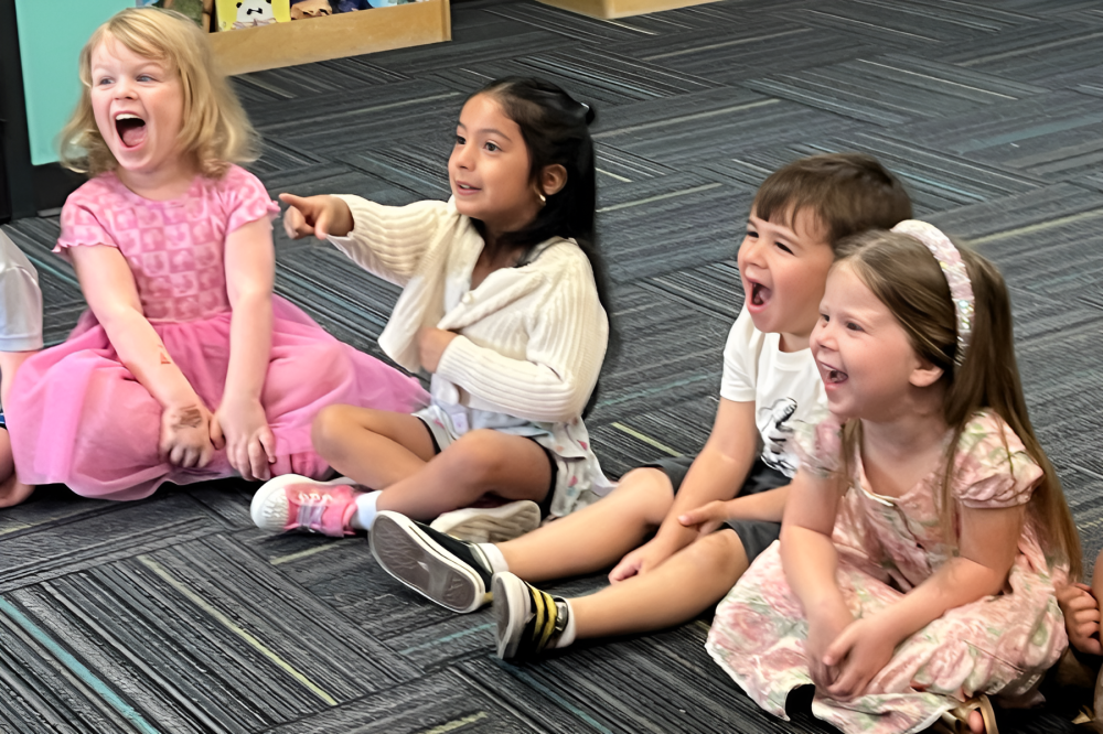 Kids laugh at preschool in Houston