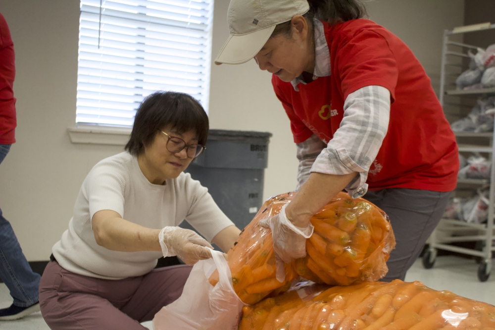 About 400 families register monthly for Fort Bend Care Center's food market event. The nonprofit distributes over 30,000 pounds monthly through the weekly event. (Kelly Schafler/Community Impact)