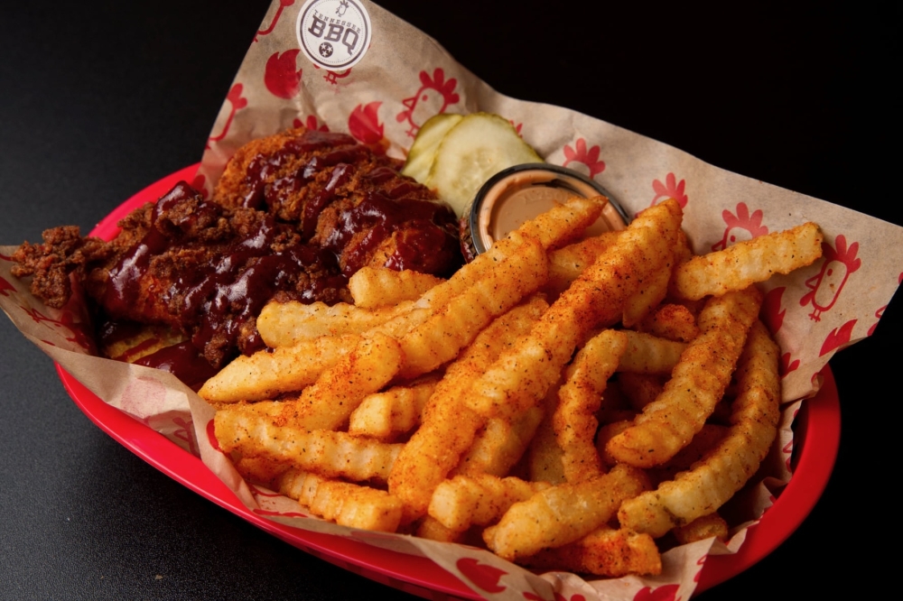 The eatery specializes in chicken sandwiches, baskets, and chicken and waffles—all halal and offered in varying heat levels. (Courtesy Urban Bird Hot Chicken)