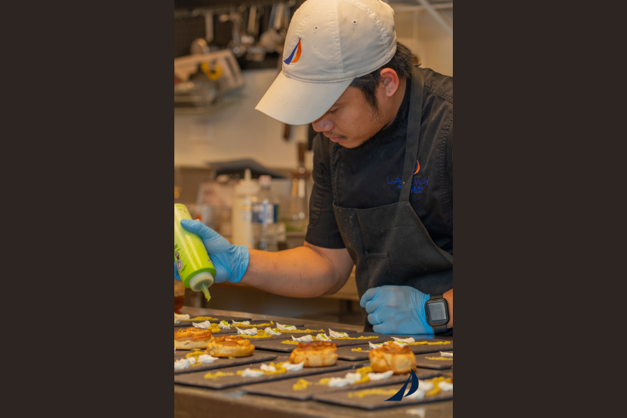 Chef making food at restaurant in Lakeway