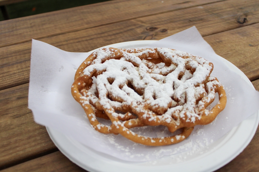 The business' menu features classic state fair bites including funnel cake for $6. (Dacia Garcia/Community Impact)