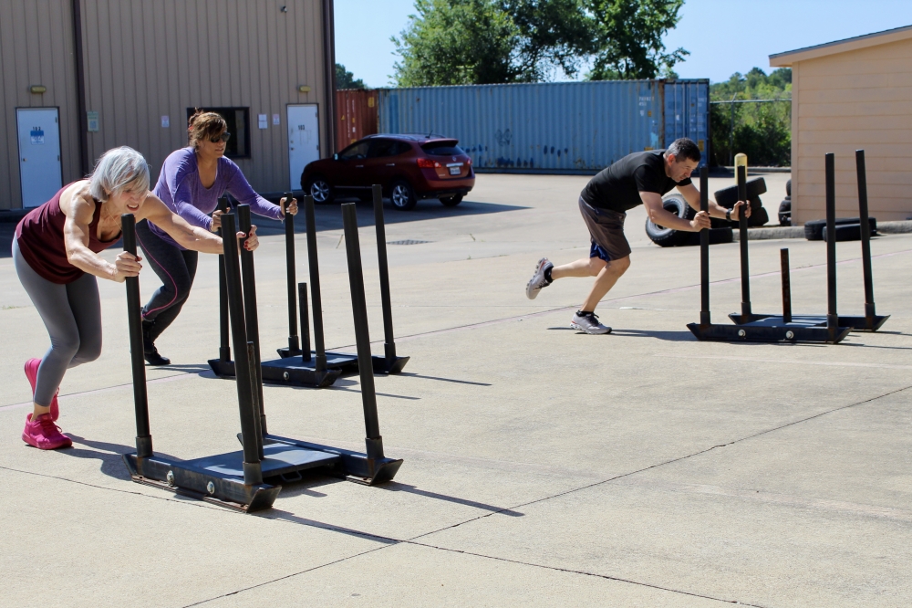 Aja and Aryan Barto enforce cardiovascular exercises to promote movement and overall wellness within older age groups. (Jovanna Aguilar/Community Impact)