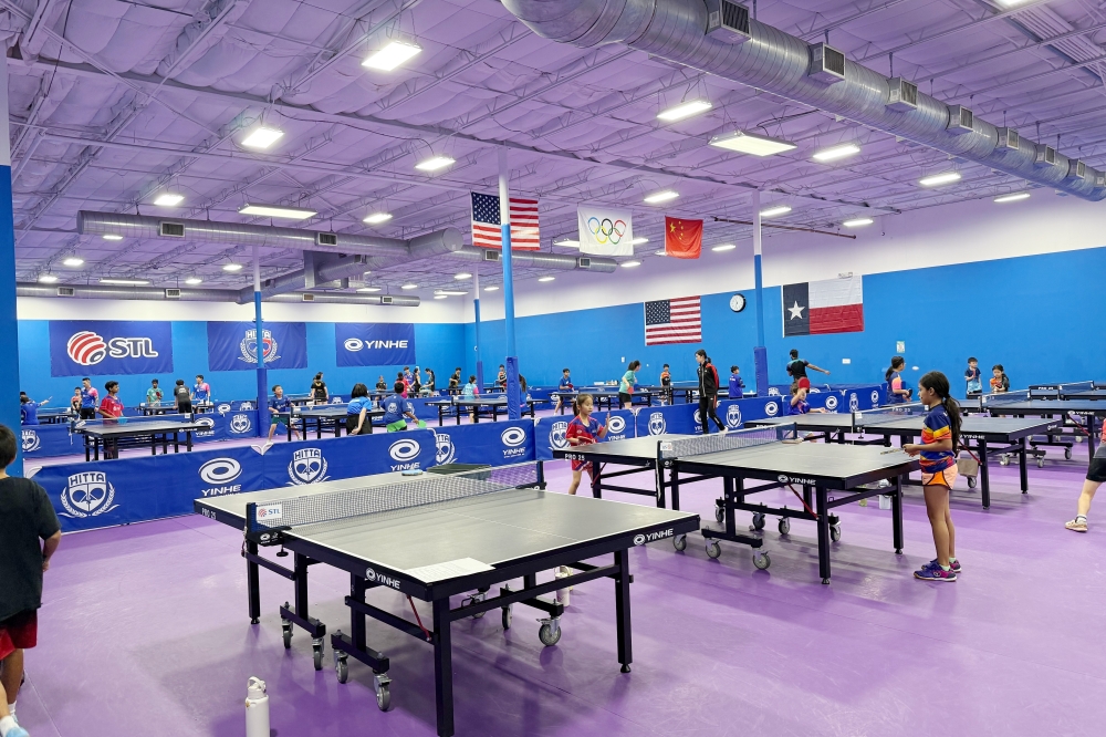 The academy focuses on providing table tennis training programs for youths to help them develop skills, improve their stamina, enhance reflexes and cultivate critical thinking skills. (Courtesy Houston International Table Tennis Academy)