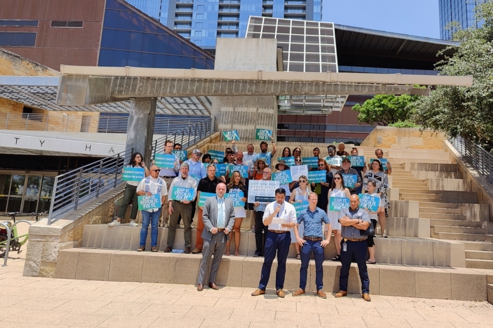 Council members and residents favoring a more extensive capping plan rallied for that strategy at City Hall May 20. (Ben Thompson/Community Impact)