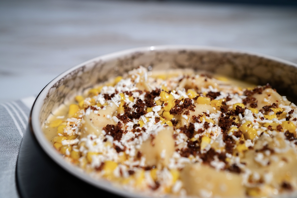 A restaurant favorite is the street corn agnolotti—made with corn puree, roasted corn, homemade chili lime sauce, butter, lime juice and pasta topped with cotija cheese. (Courtesy Thuy An Photography/Belly of the Beast)