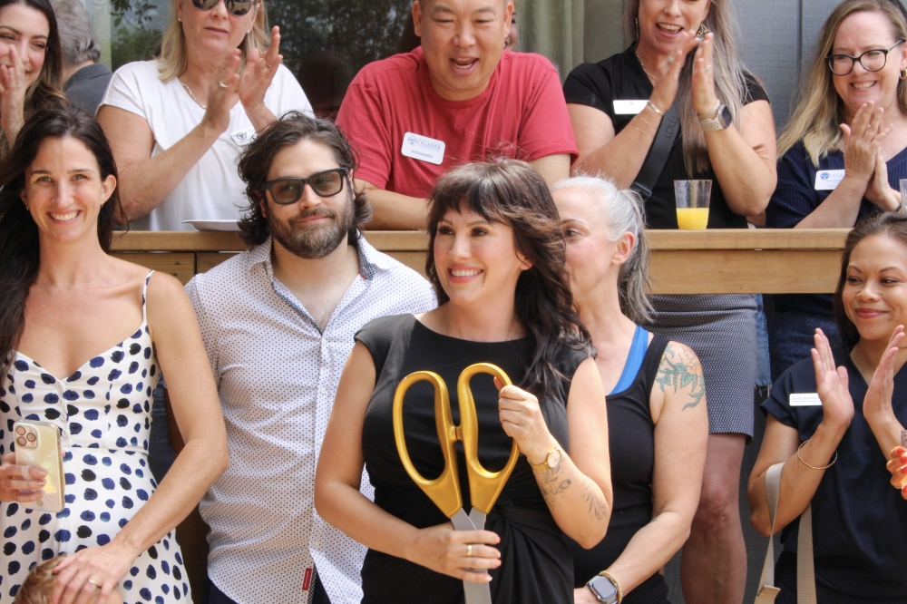 Draven Lane (center), owner of Fire and Flow Pilates studio, said she welcomes everyone in her space, from beginners to trained athletes. (Elisabeth Jimenez/Community Impact)