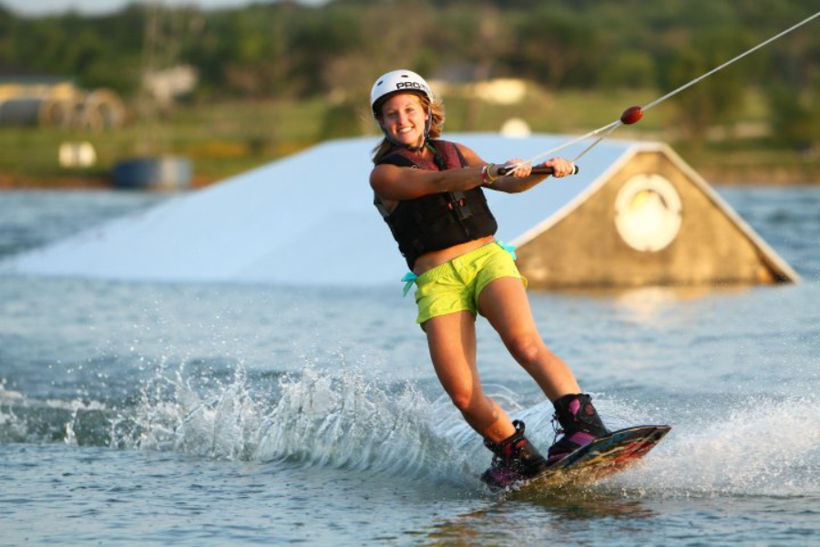 Woman taking wakeboarding lessons in New Braunfels